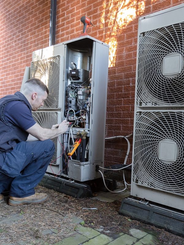 Inspecting air con outside